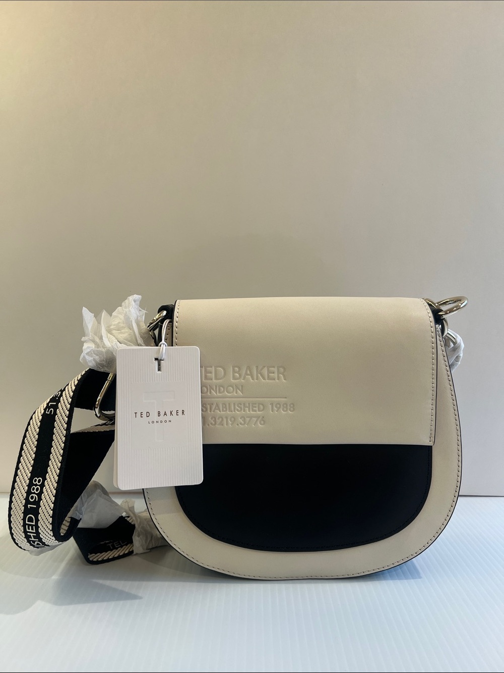 New Ted Baker Cream and Black Saddle Crossbody with Logo Emboss